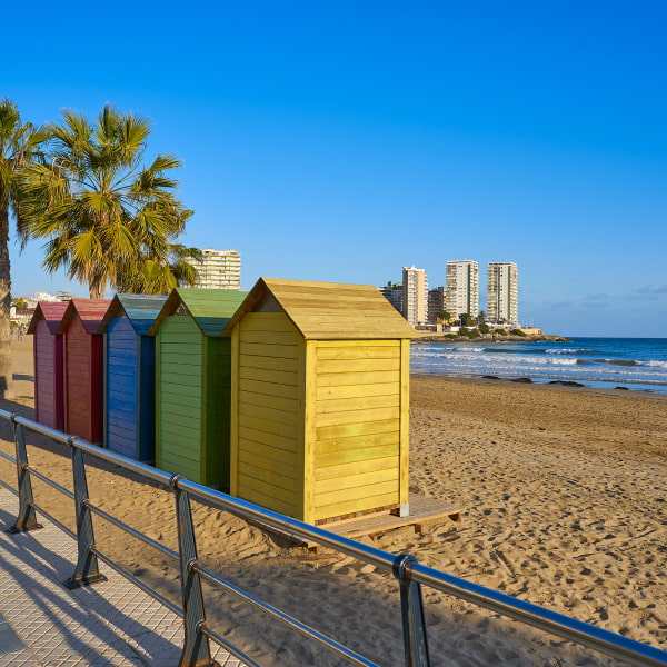 Colourful beach huts on the sand
